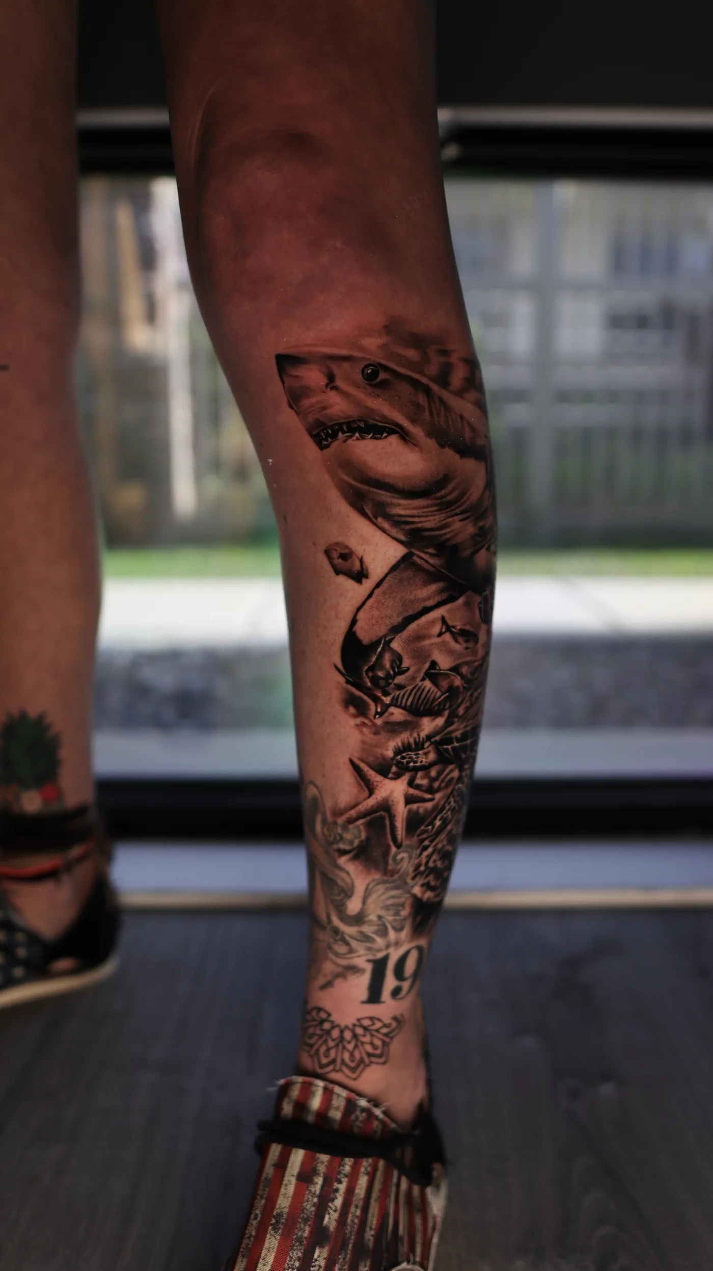 Leg composition, front view tattoo by Eddie Gonzalez