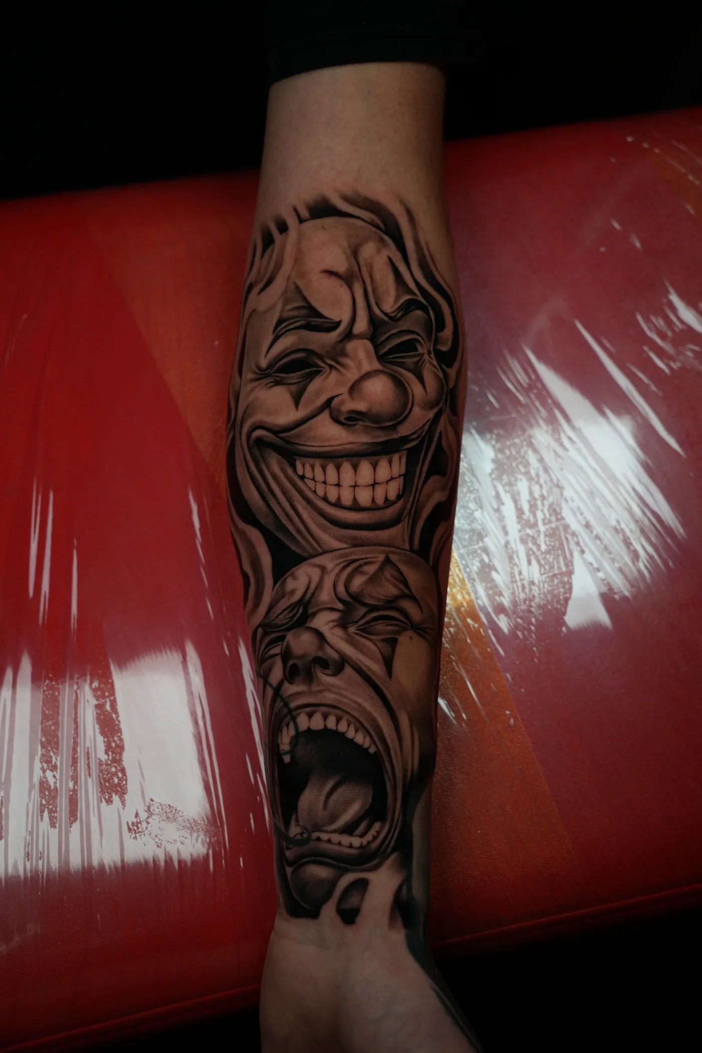 Figurative forearm tattoo by Eddie Gonzalez