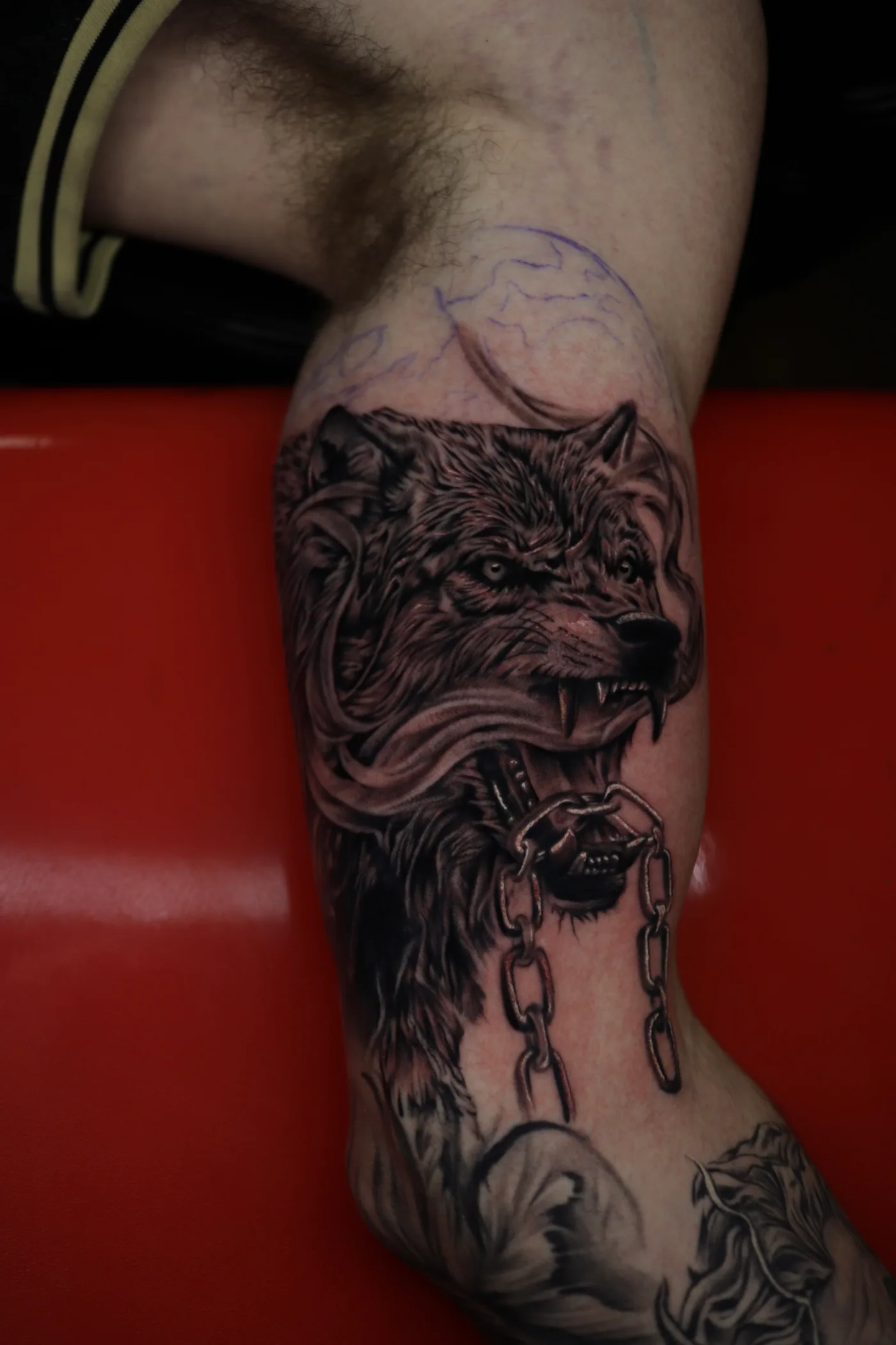 Black and grey leg work tattoo by Eddie Gonzalez