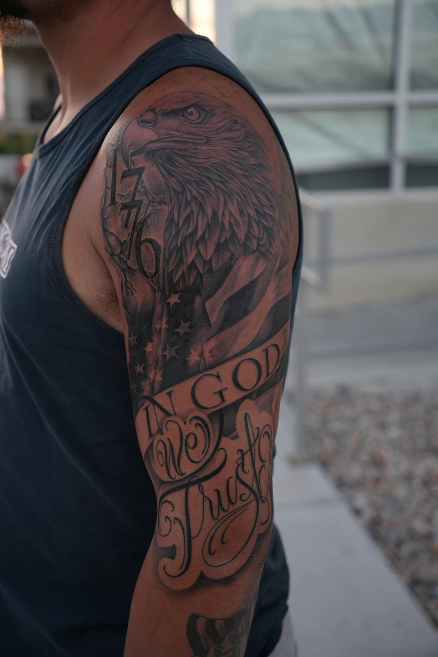 Portrait sleeve tattoo by Eddie Gonzalez