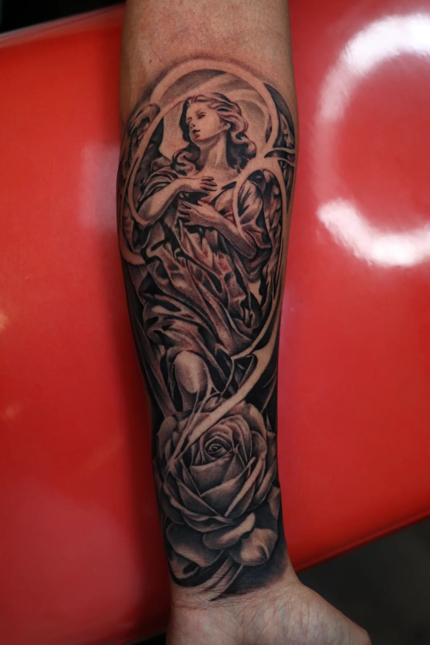 Figure and roses tattoo by Eddie Gonzalez