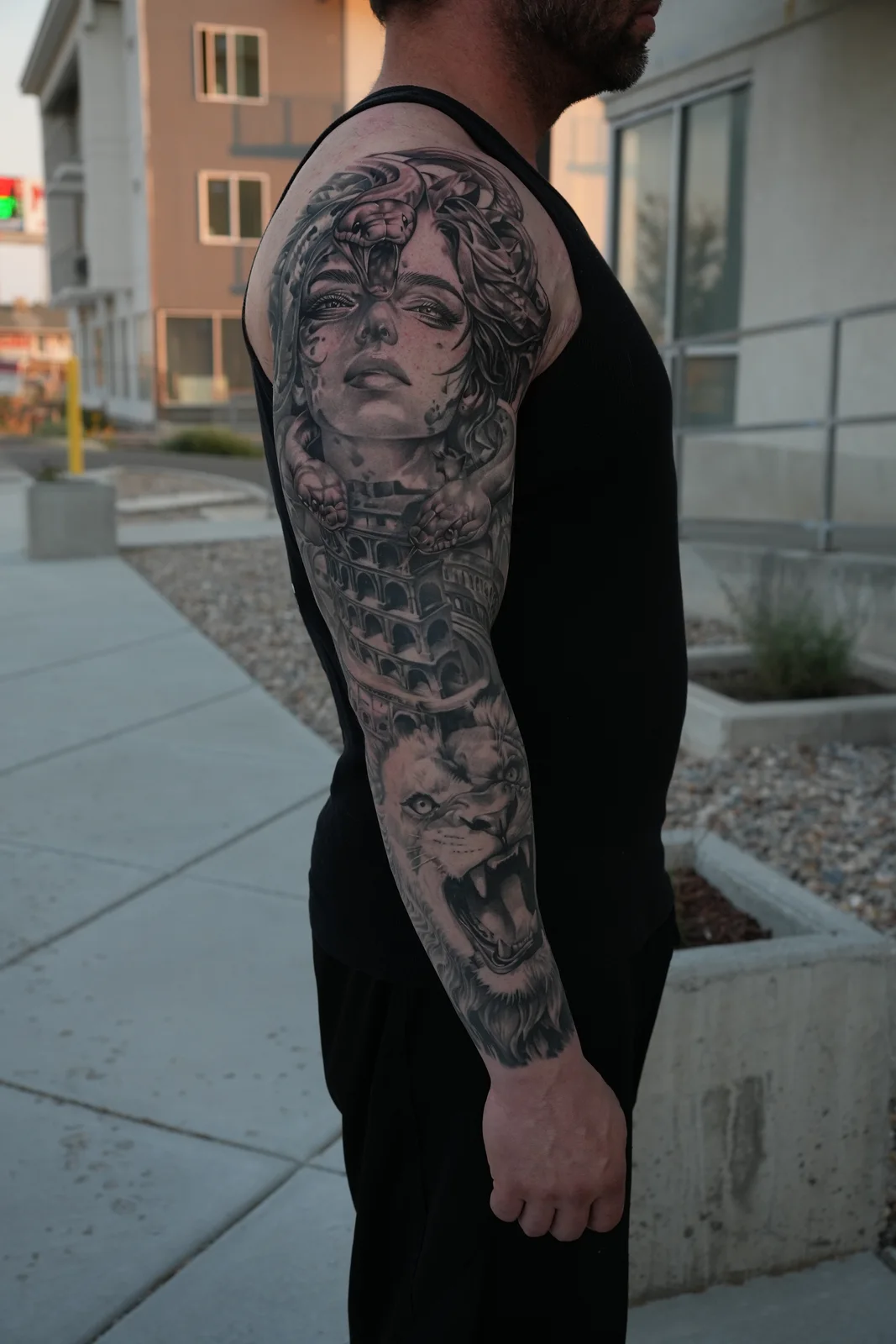 Portrait sleeve tattoo by Eddie Gonzalez