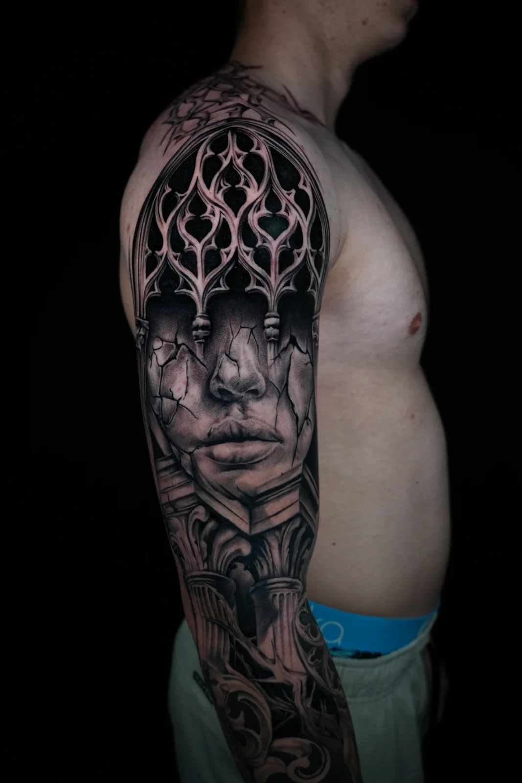Crowned portrait tattoo by Eddie Gonzalez