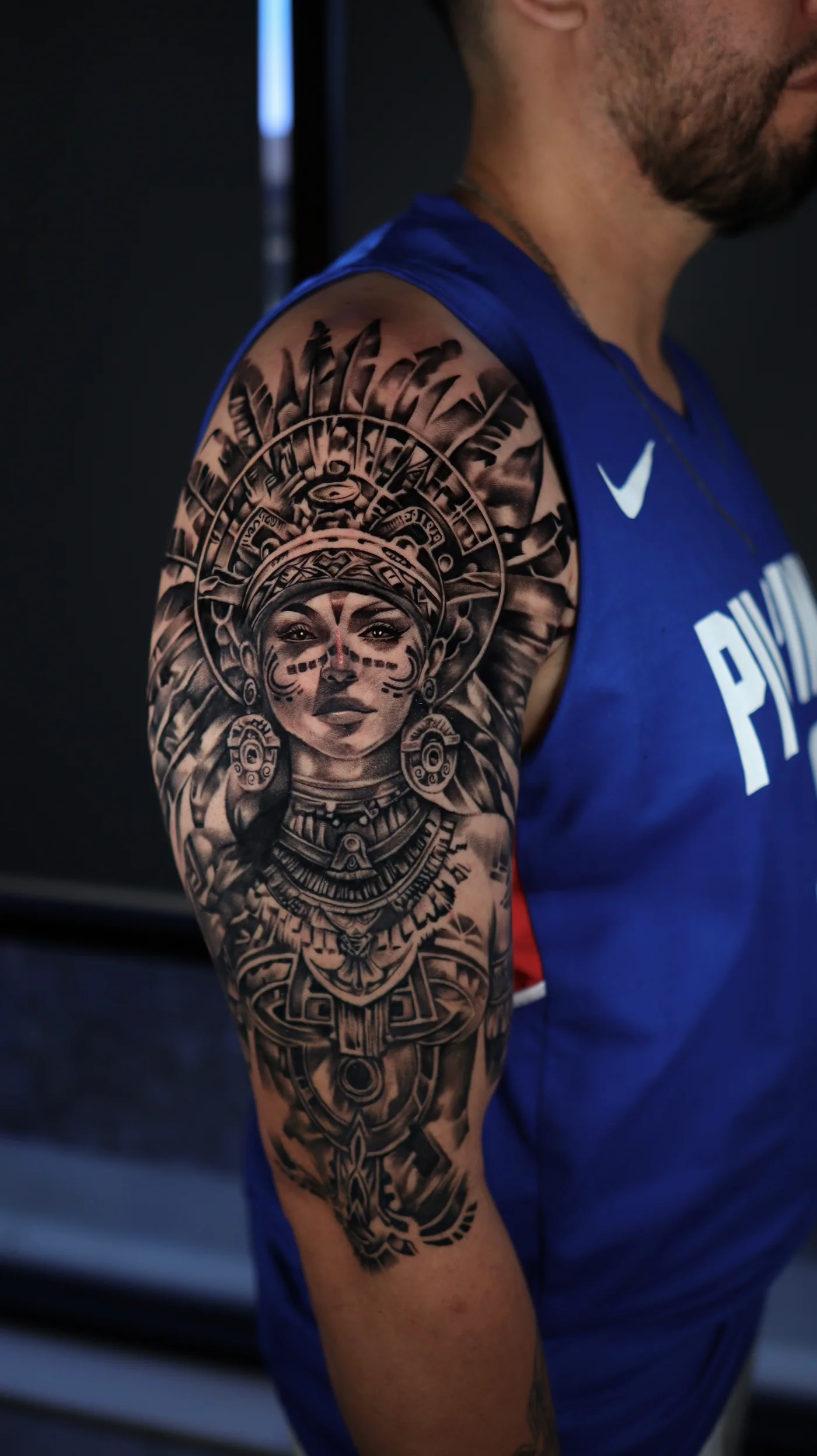 Shoulder composition tattoo by Eddie Gonzalez